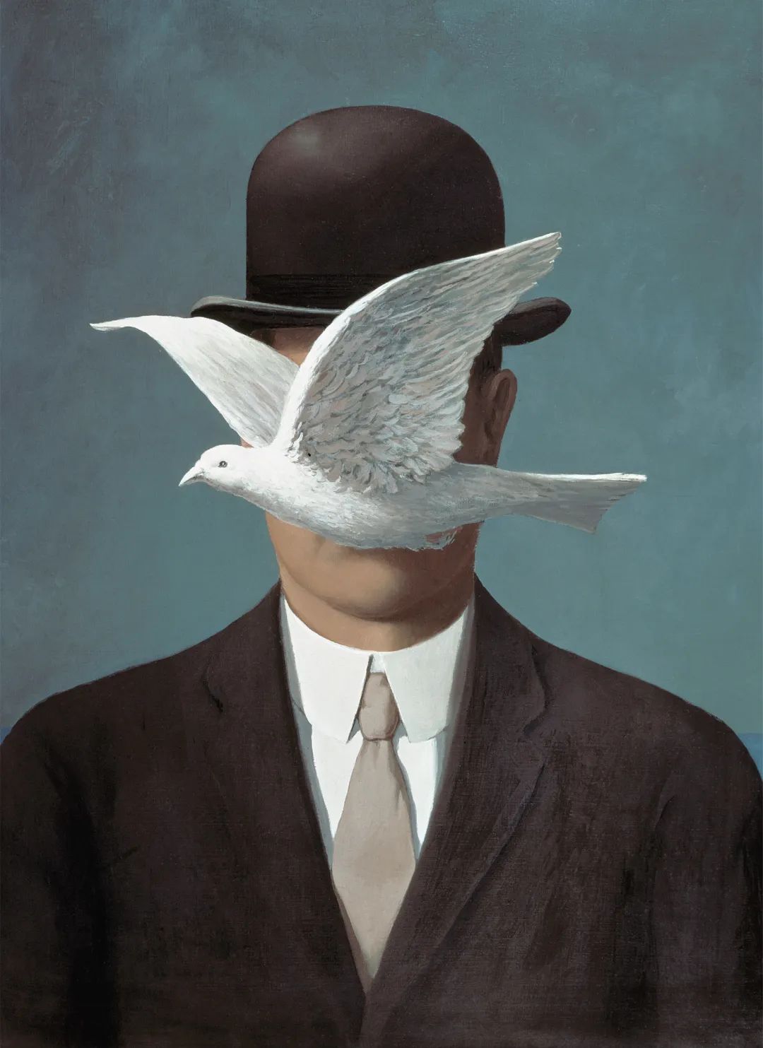 勒内·马格里特《戴黑帽的男人》