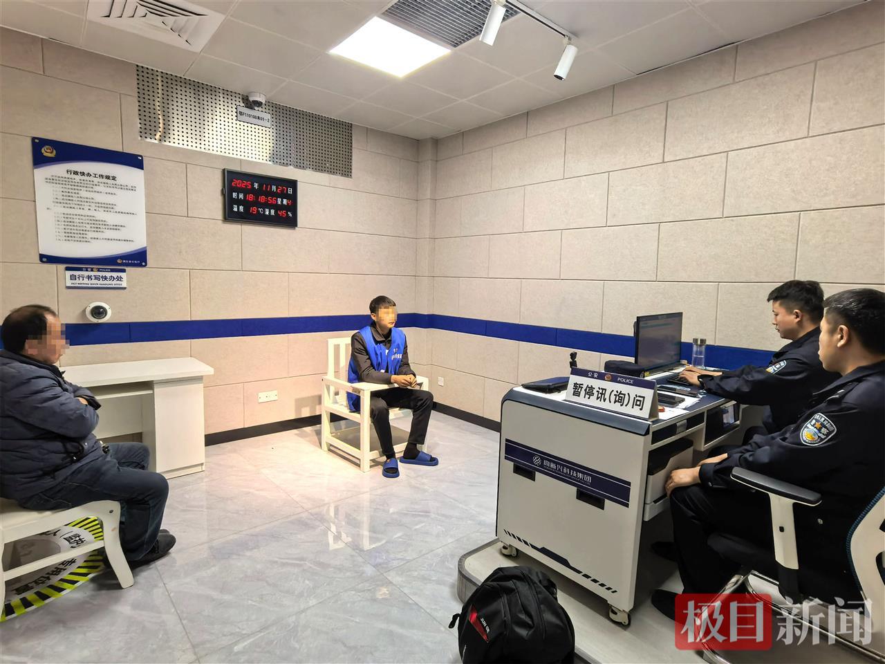 图7：民警正在讯问盗窃嫌疑人。.jpg