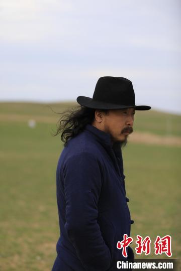 图为顾桃. 巴图 摄