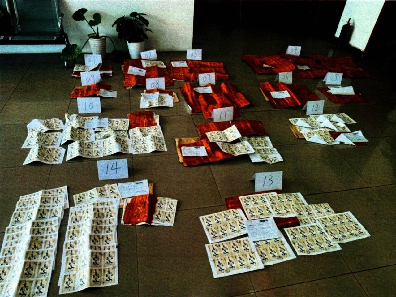 国际包裹现上千假邮票 法治利刃斩断犯罪链条